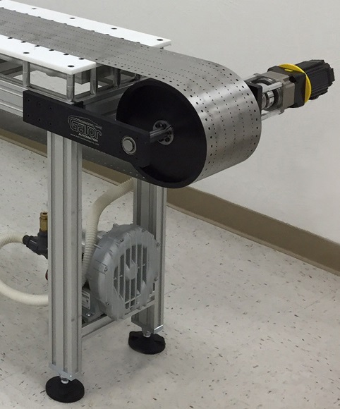 Metal Conveyor Belt for a Vapor Deposition Process in High Vacuum