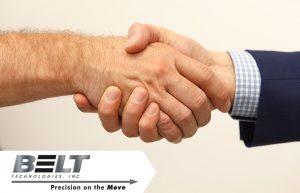 Picture of two men shaking hands for blog on get to know your customers day